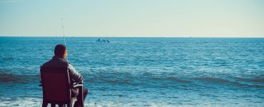 Man surf fishing