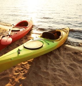 two kayaks on shore