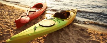 two kayaks on shore