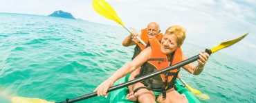 two older people kayaking