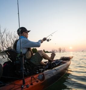 person in 10 foot fishing kayak