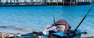 a budget fishing kayak on the beach