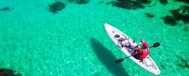 person in a fishing kayak