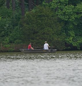 2 anglers in a fishing boat on an alabama lake