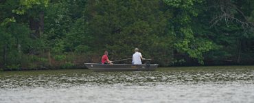 2 anglers in a fishing boat on an alabama lake