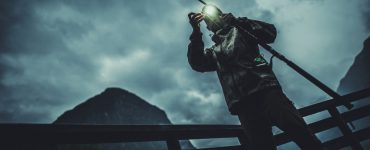 person night fishing with a head lamp on