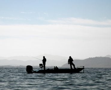 two anglers on a fishing boat